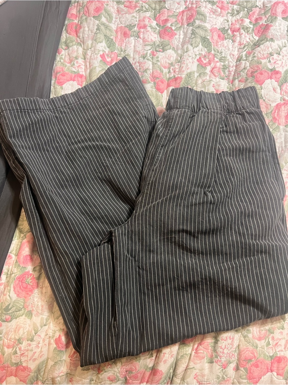 Woman’s gray pinstripe wide leg trouser